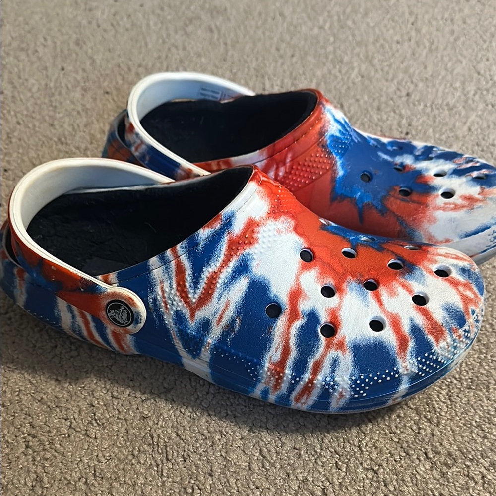 Crocs—red, white and blue.  Fleece lining. Men’s size 7/women’s size 9.